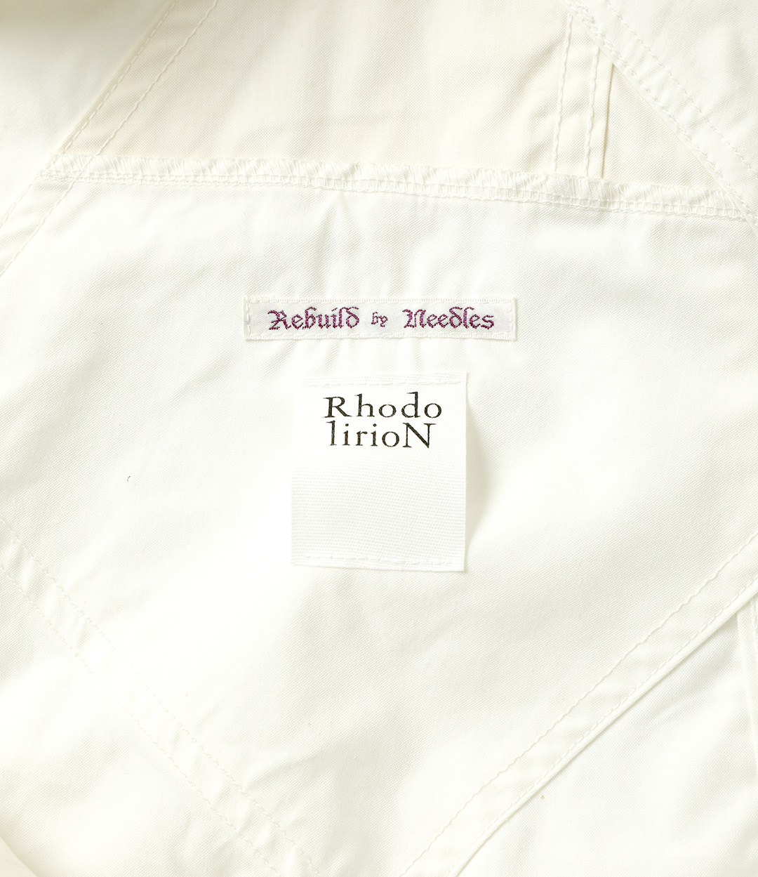 〈REBUILD by NEEDLES〉x 〈RHODOLIRION〉